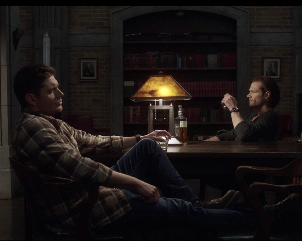 Supernatural, 'Despair': Sam and Dean drinking in the library | The CW